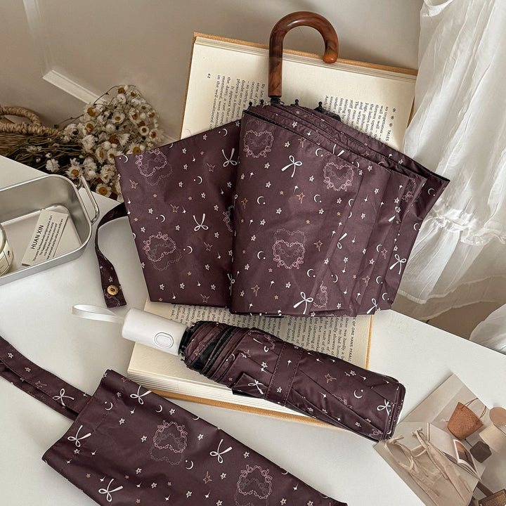 Women's folding umbrella with elegant pendant design Kalsten