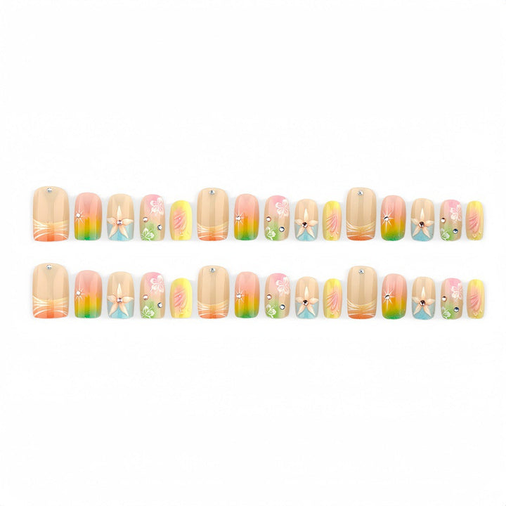 Acrylic nails with floral accents and gradient Kalsten
