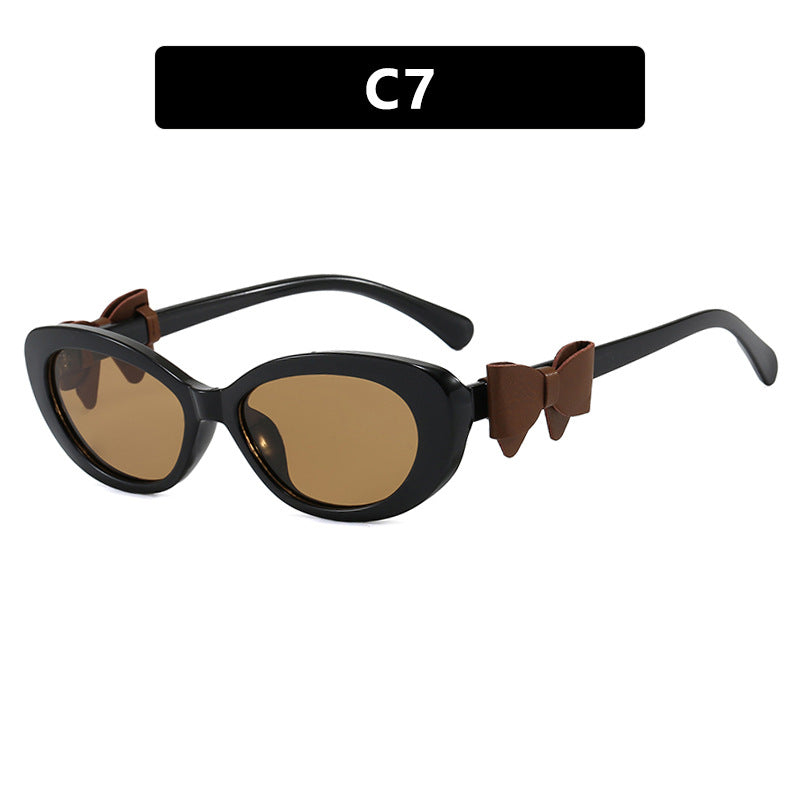 Women's fashionable sunglasses with playful bow design Kalsten