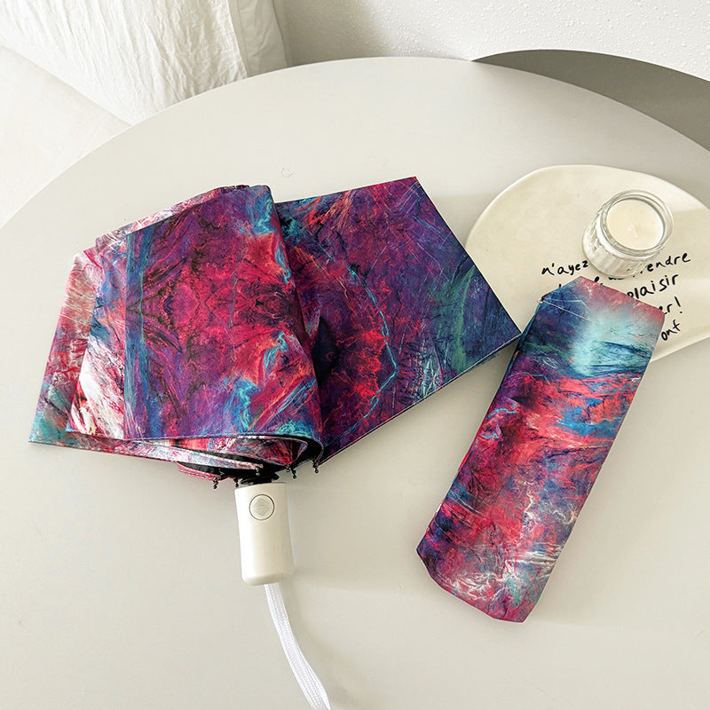 Ladies elegant folding umbrella with unique marble pattern Kalsten