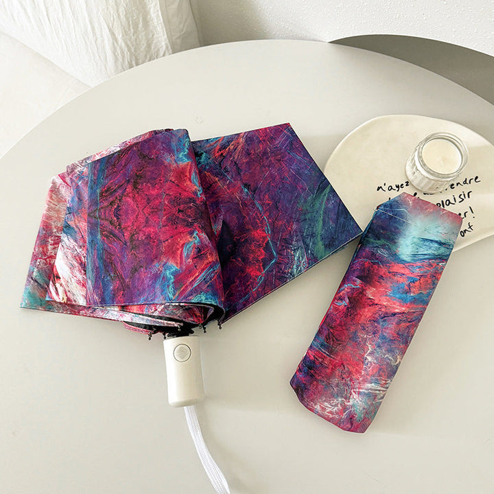 Ladies elegant folding umbrella with unique marble pattern Kalsten