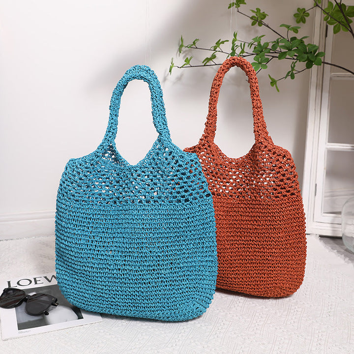 Handcrafted straw bag with wide carrying handle Kalsten