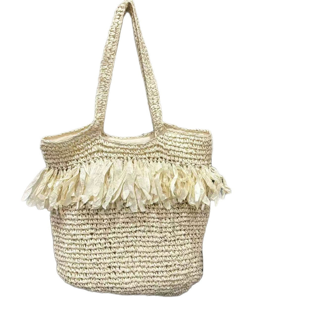Straw bag with fringes and modern details Kalsten