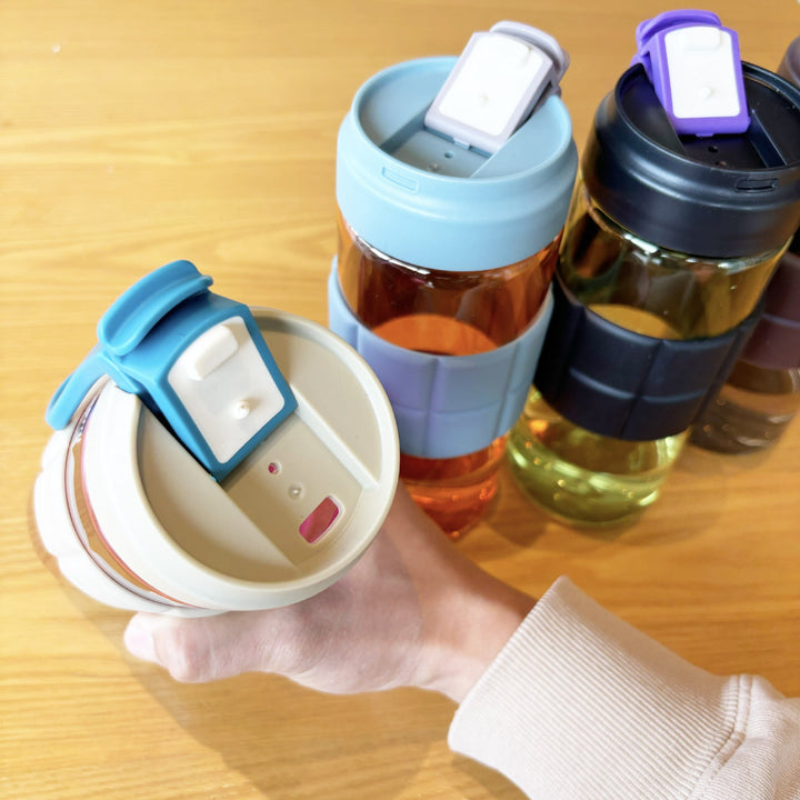 Women's transparent drinking bottle with non-slip silicone coating Kalsten