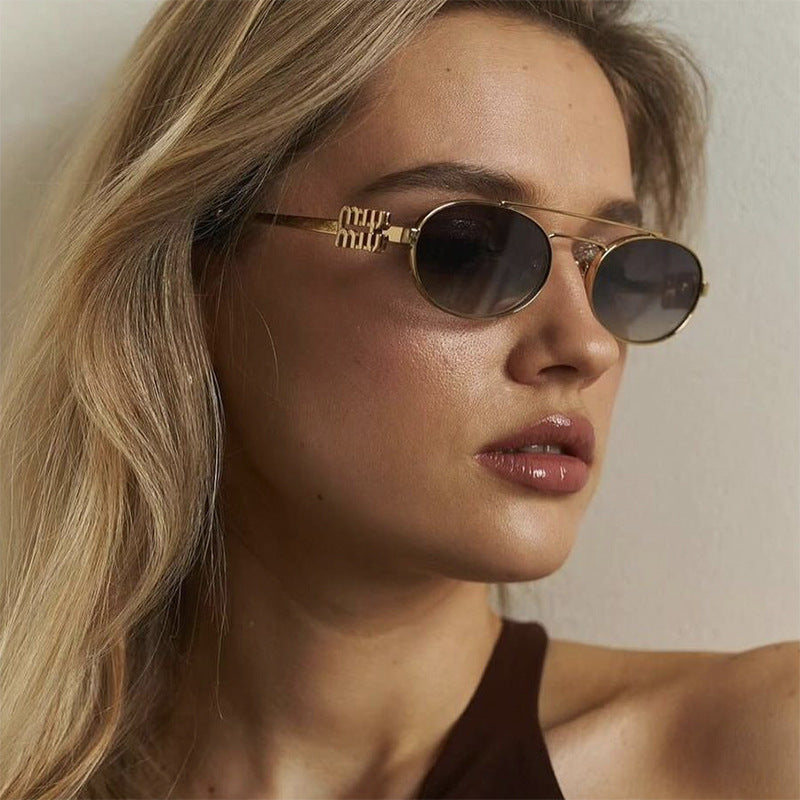 Women's elegant oval sunglasses with luxurious metal frame Kalsten
