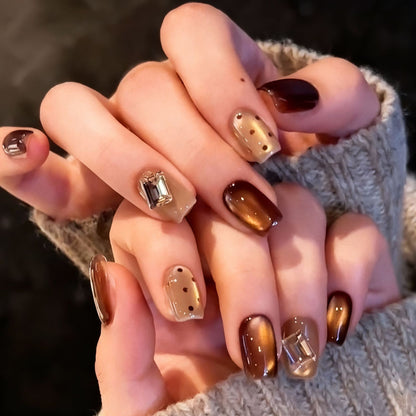 Acrylic nail set with elegant ombre designs and sparkling accents Acalora