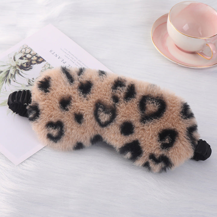 Women's cuddly faux fur sleep mask with heart-embossed surface and gathered comfort band Kalsten