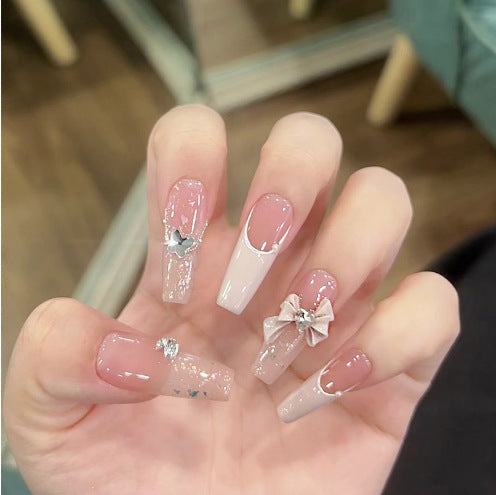 Glamorous artificial nails with moon and star motifs Kalsten