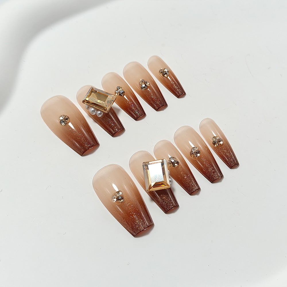Artificial nails with elegant ombre effect and exquisite gemstones Kalsten