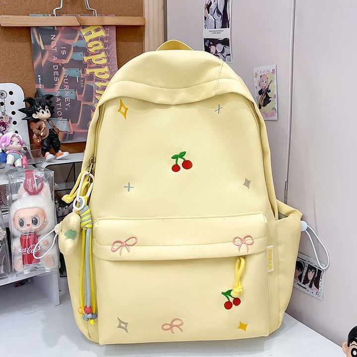 Playful backpack with embroidery Kalsten