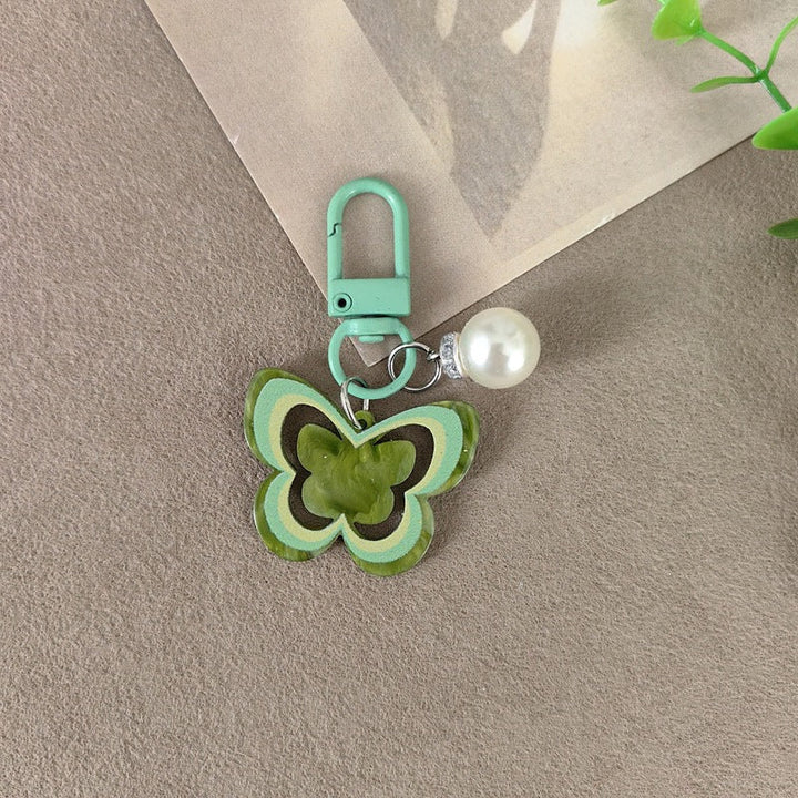 Keychain with butterfly and pearl accent Kalsten