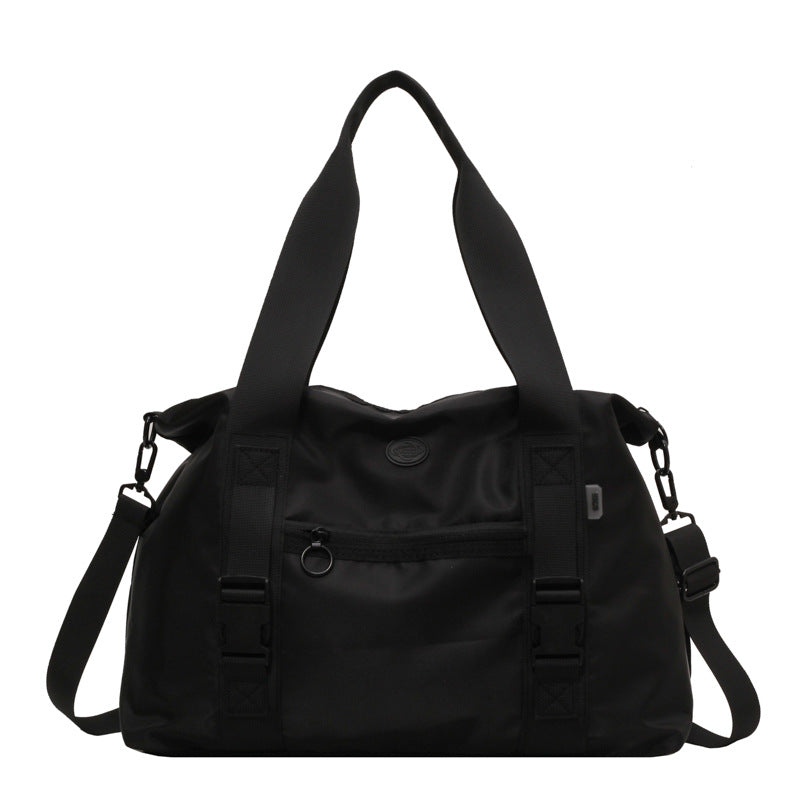 Spacious sports duffel bag with ergonomic carrying handles and water-repellent material Kalsten