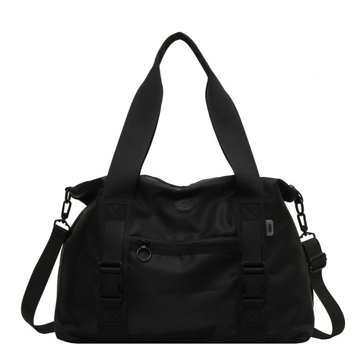 Spacious sports duffel bag with ergonomic carrying handles and water-repellent material Kalsten