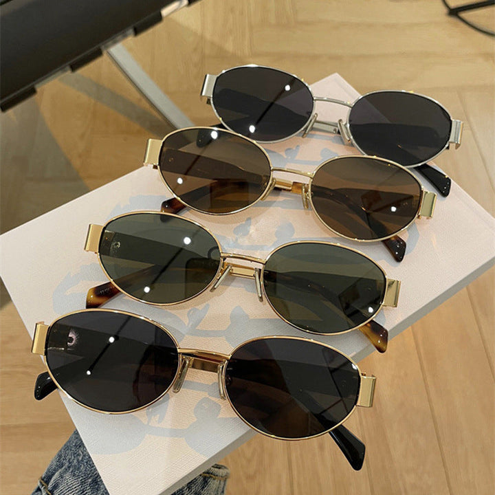 Ladies fashionable sunglasses in an elegant oval design with a sturdy metal frame Kalsten