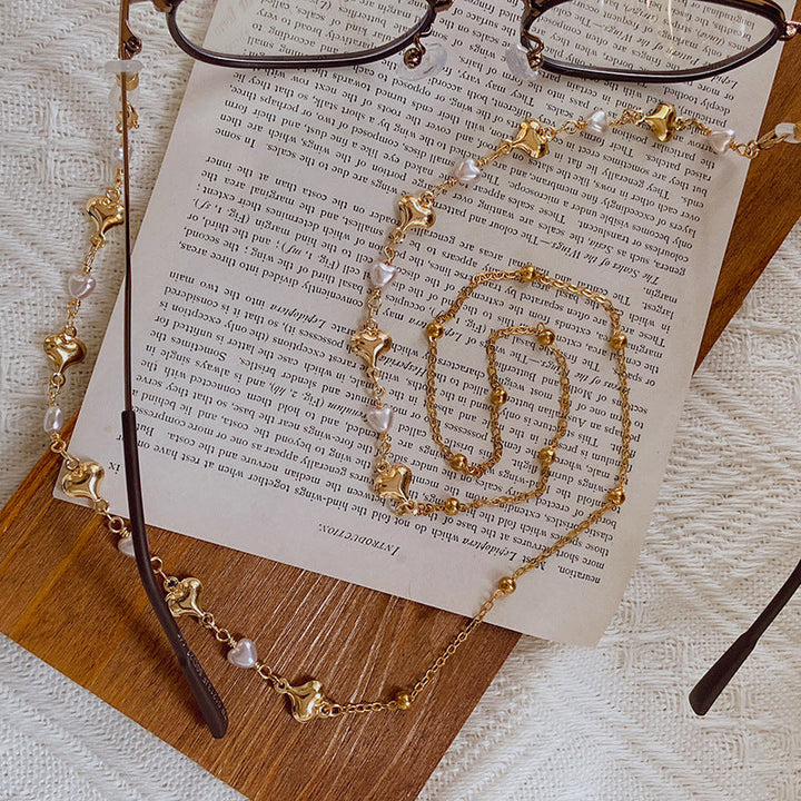 Fashionable necklace with pearls and golden accents Kalsten