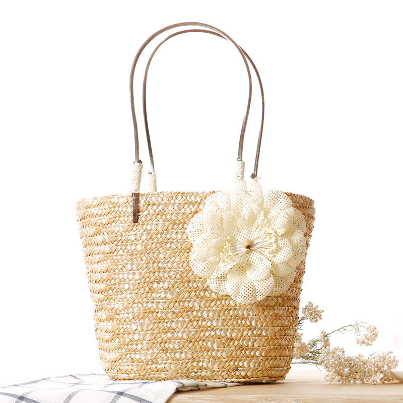 Elegant bast bag with flower appliqué Kalsten