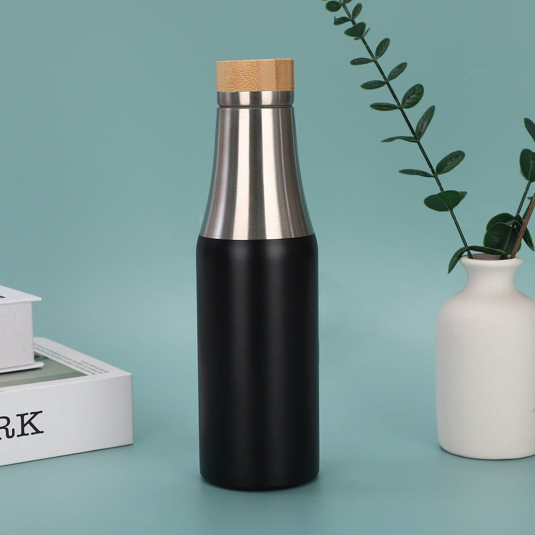 Women's stainless steel insulated drinking bottle with bamboo lid Kalsten