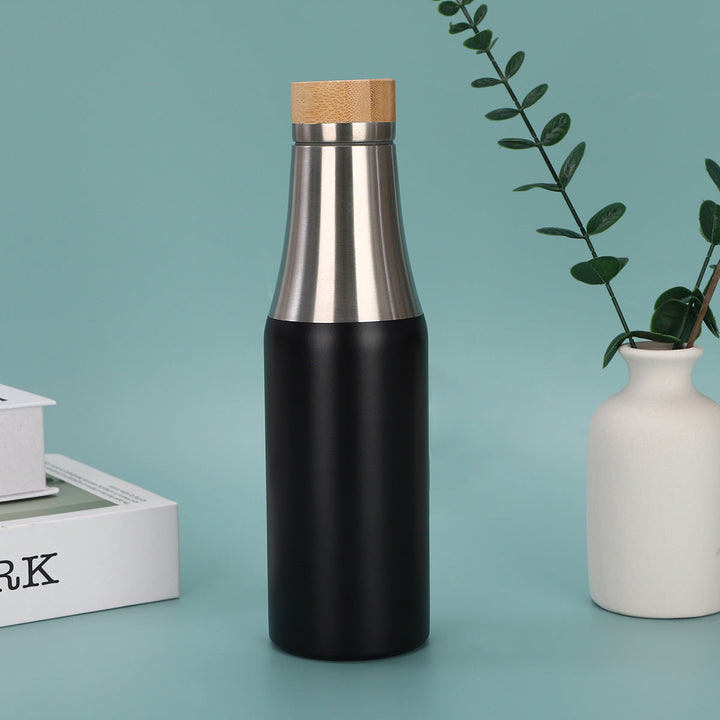 Women's stainless steel insulated drinking bottle with bamboo lid Kalsten