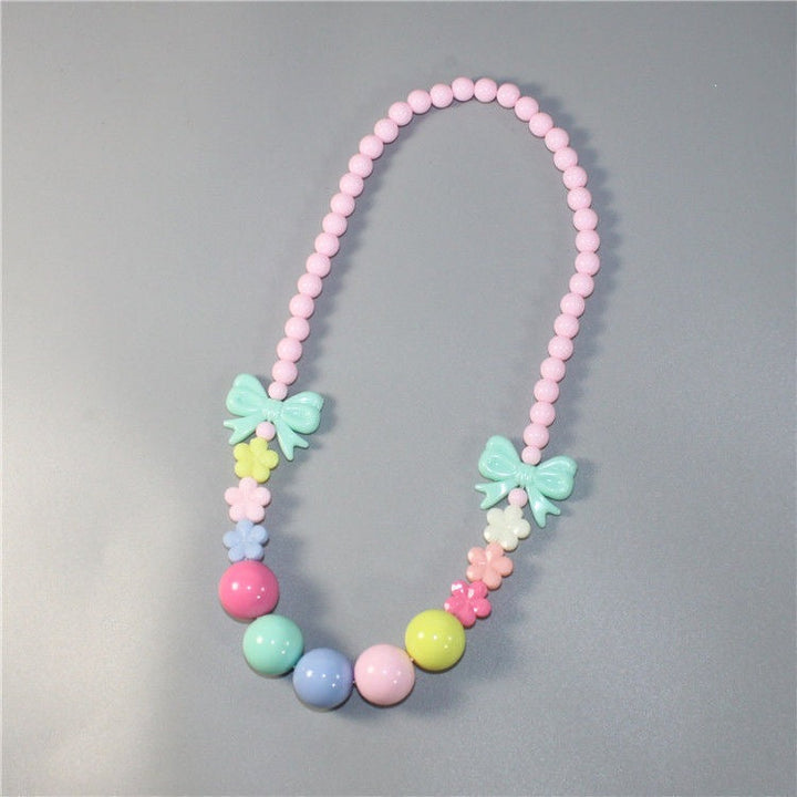 Colorful pearl necklace with floral elements Kalsten