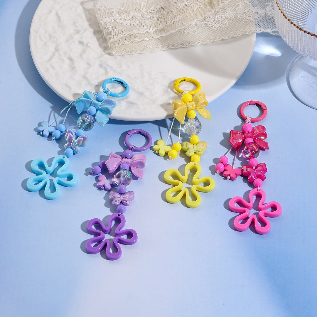 Playful keychain with flower and butterfly details Kalsten