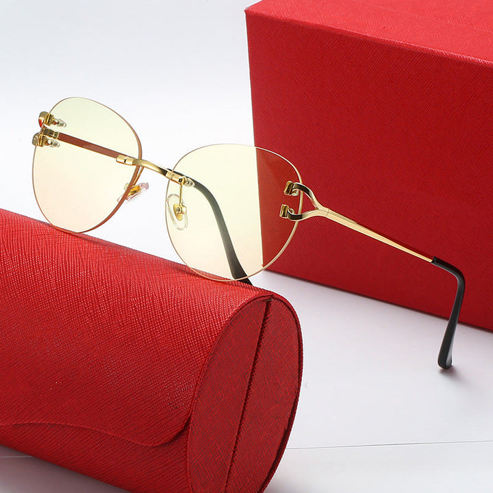 Ladies elegant Cat-Eye sunglasses with gold accents and UV protection Kalsten