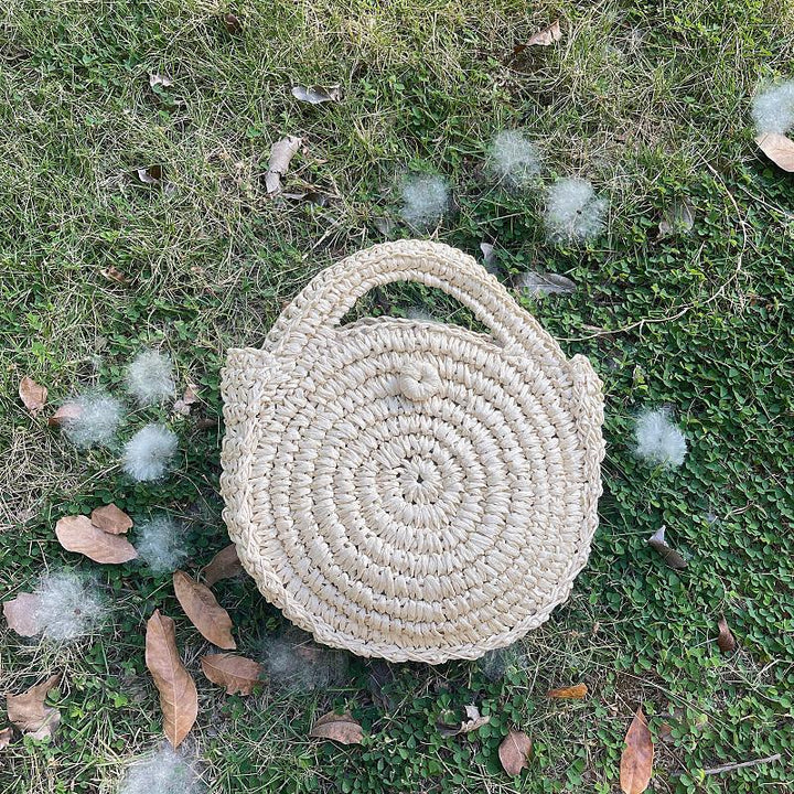Handcrafted Round Wicker Bag with Elegant Closure Kalsten