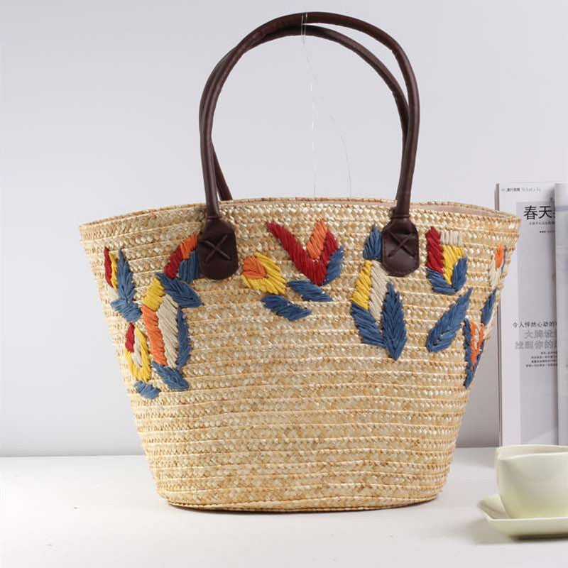 Braided beach bag with colorful embroidery pattern Kalsten