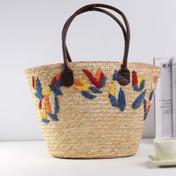 Braided beach bag with colorful embroidery pattern Kalsten