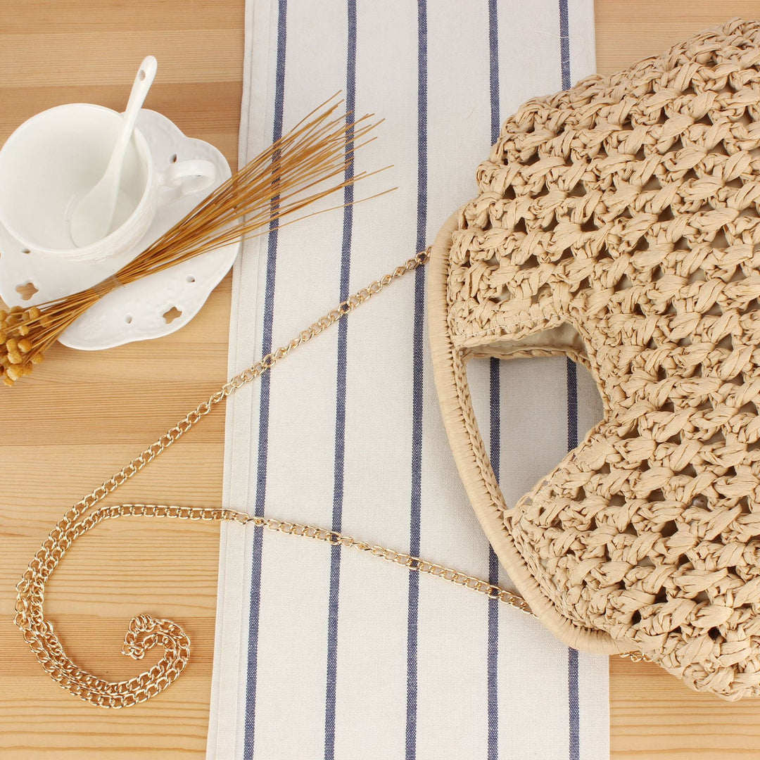 Fine straw shoulder bag with elegant chain accents Kalsten