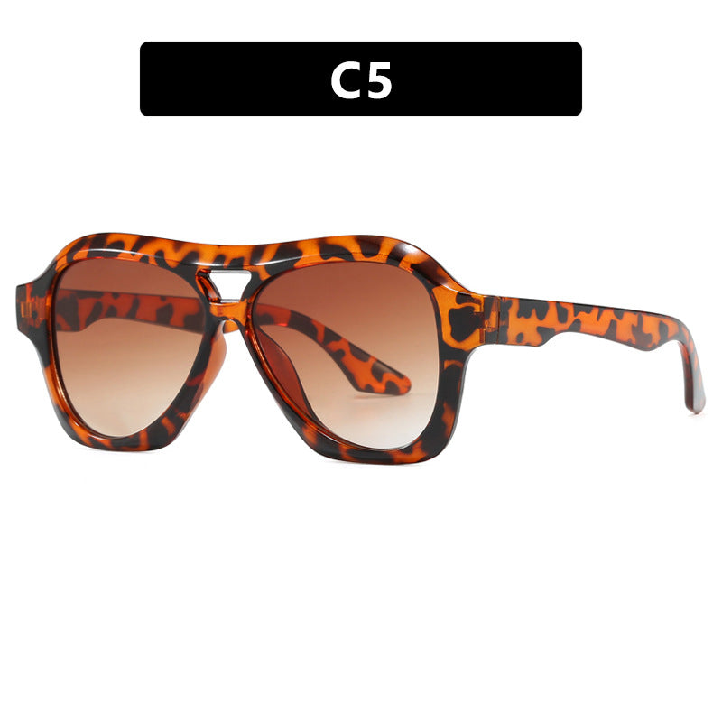 Ladies fashionable sunglasses in innovative design with wide frame Kalsten