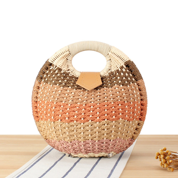 Round straw bag with elegant leather handle Kalsten