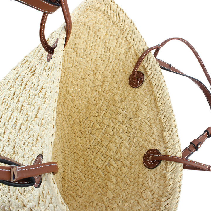 Elegant handbag made of woven natural material with sturdy leather handles Kalsten