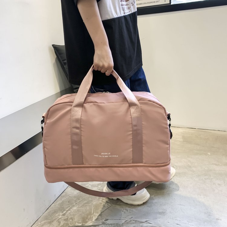 Sporty Travel Bag With Spacious Interior Compartment And Removable Shoulder Strap Kalsten