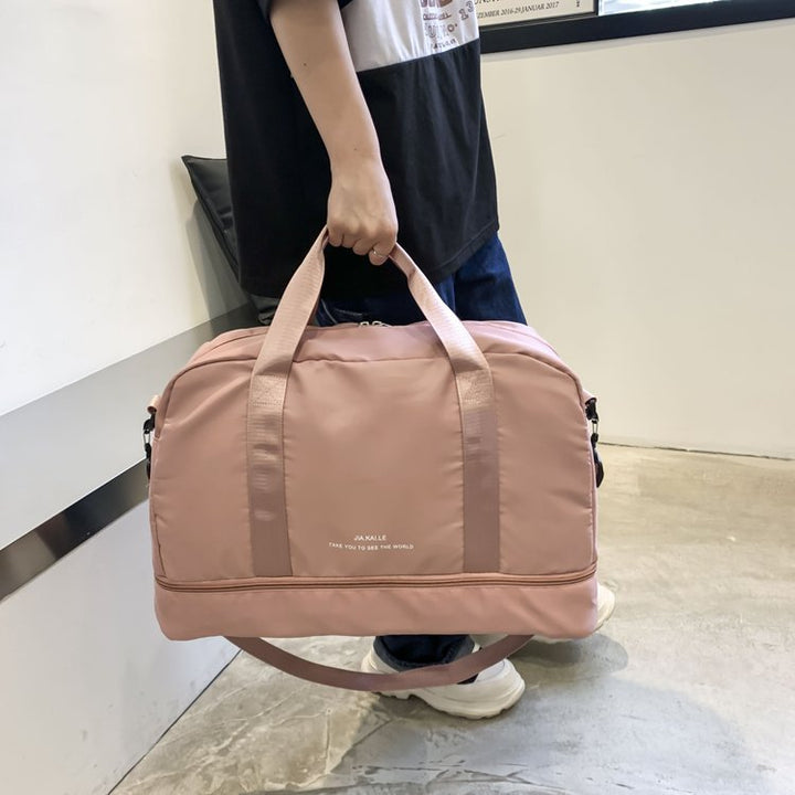 Sporty Travel Bag With Spacious Interior Compartment And Removable Shoulder Strap Kalsten