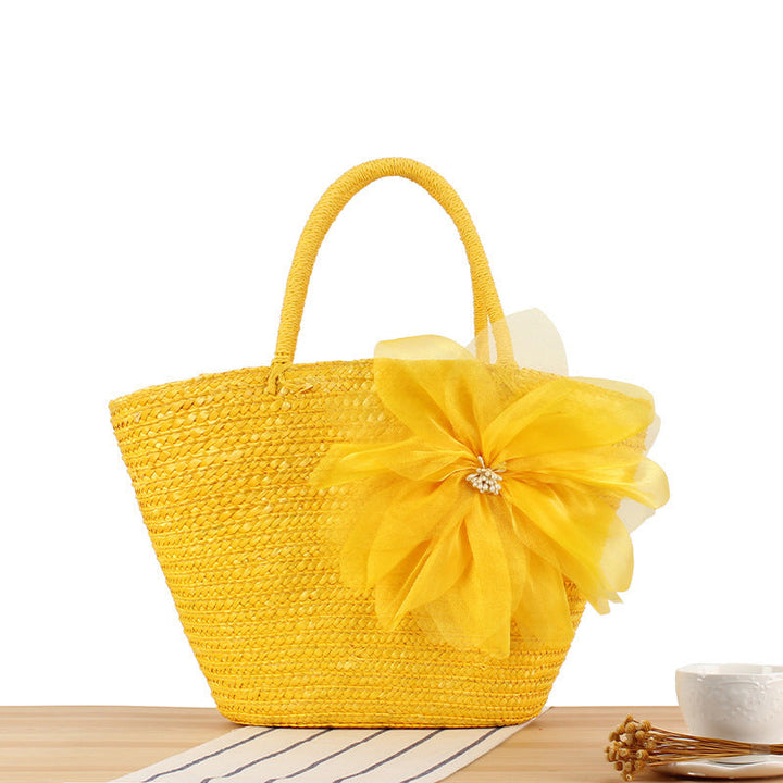 Elegant straw bag with floral accents Kalsten