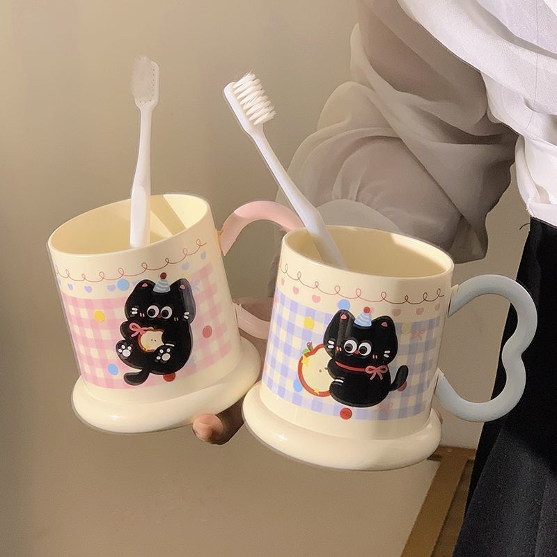 Ceramic mug with playful cat motif Kalsten