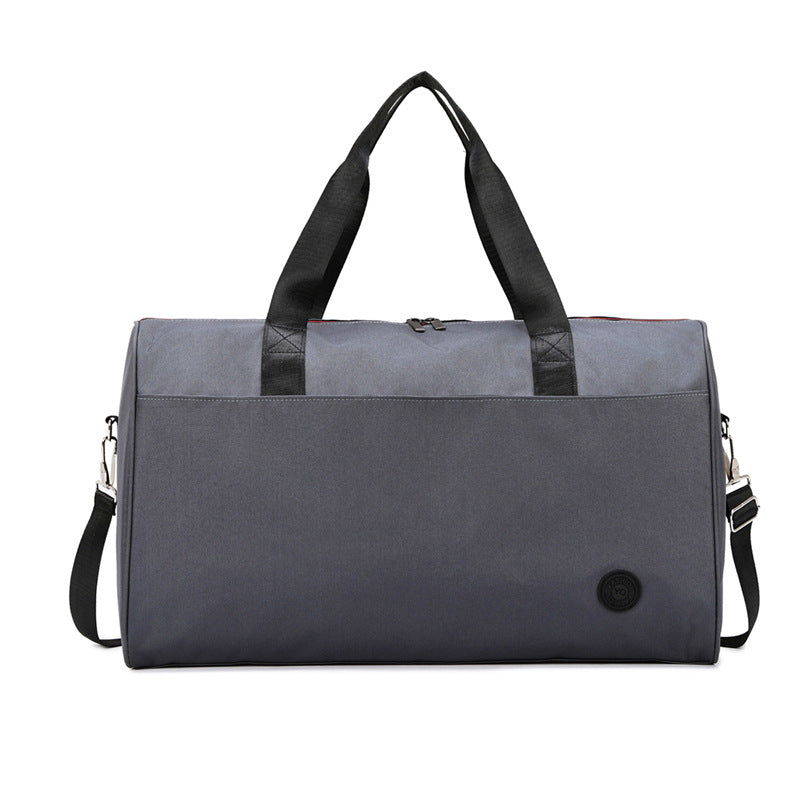Sporty travel bag with sturdy carrying handles and removable shoulder strap Kalsten
