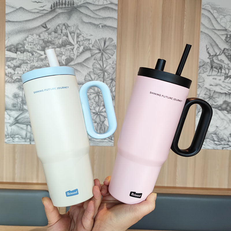 Women insulated drinking container with ergonomic handle Kalsten