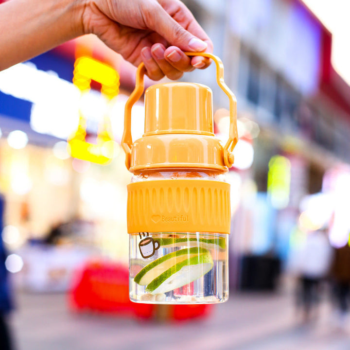 Ladies trendy glass drinking bottle with practical silicone protection Kalsten