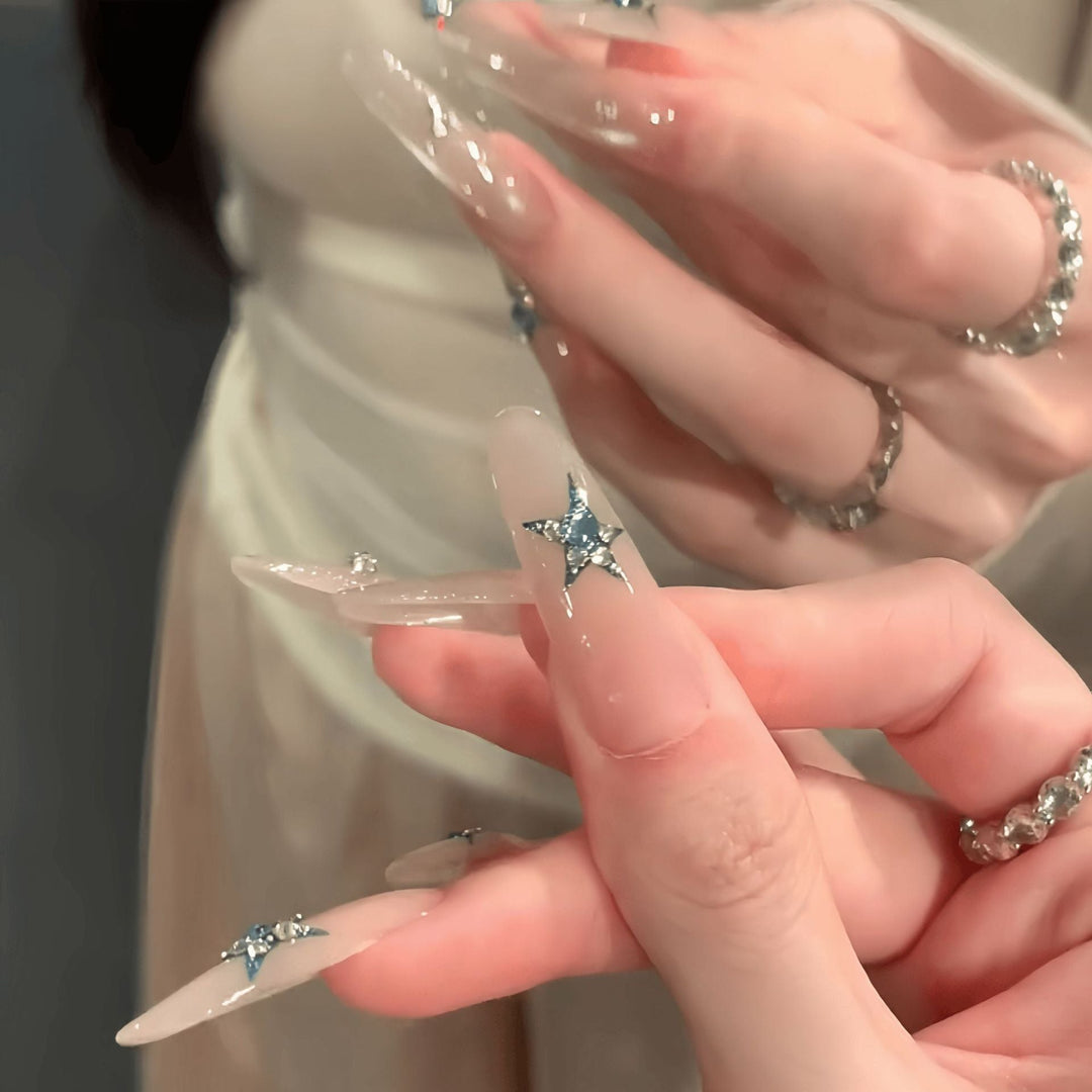 Glamorous artificial nails with star accents Kalsten