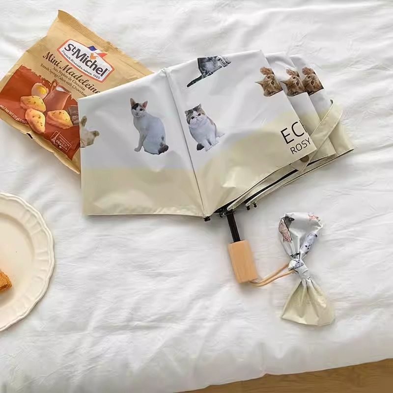Ladies folding umbrella with playful animal design Kalsten