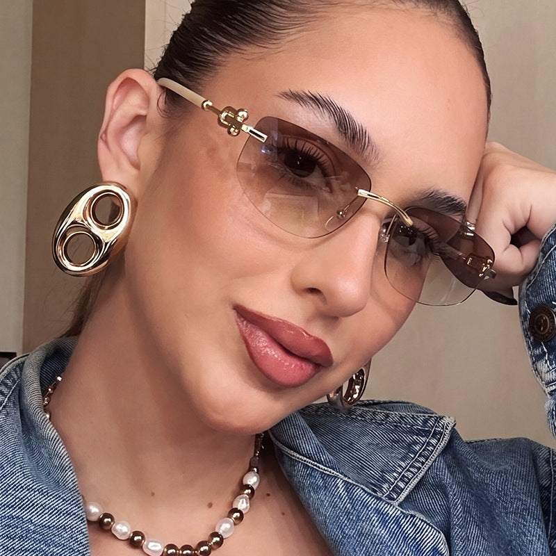 Ladies elegant semi-rimless glasses with luxurious metal frame and transparent lenses Kalsten