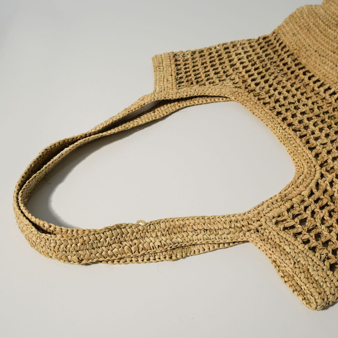 Hand-knotted raffia bag with generous interior Kalsten