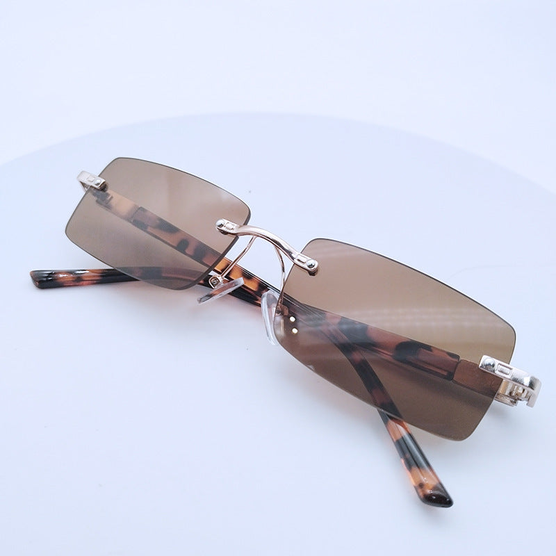 Women's fashionable rectangular sunglasses with unique design feature Kalsten