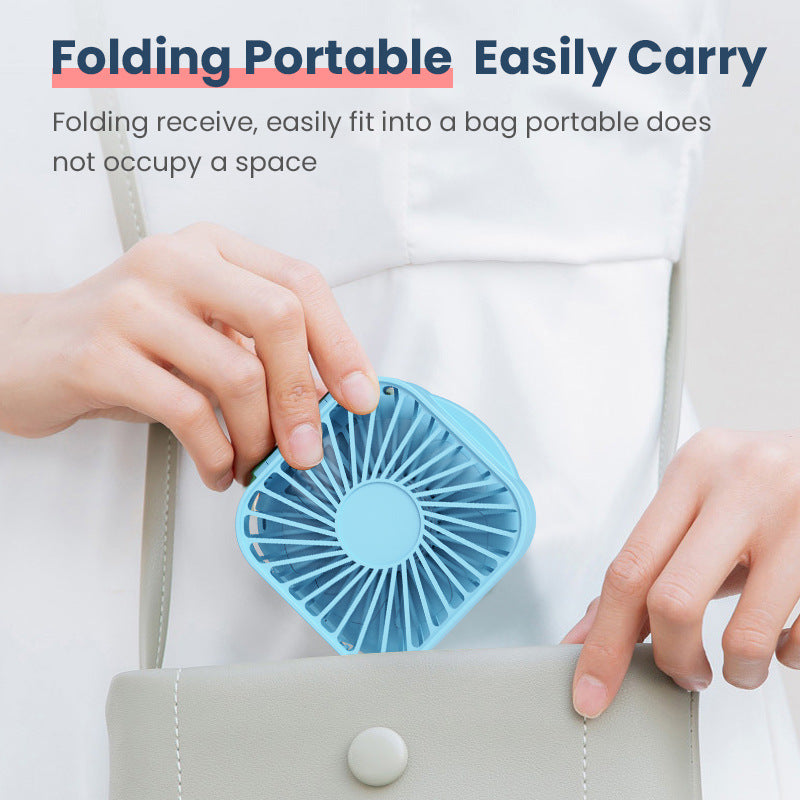 Unisex nan compact foldable clip on handheld desk fan with built in mirror adjustable tilt and USB rechargeable battery Kalsten
