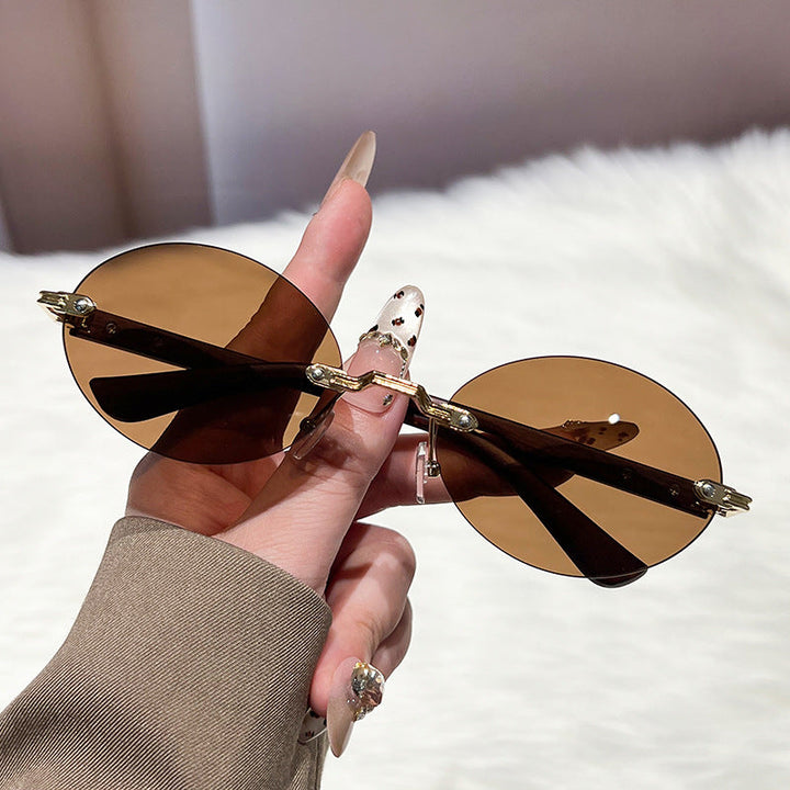 Ladies fashionable and elegant sunglasses with oval design Kalsten