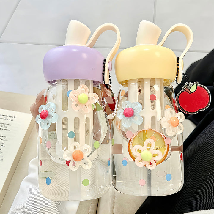 Women's water bottle with integrated fruit filter and practical carrying handle Kalsten