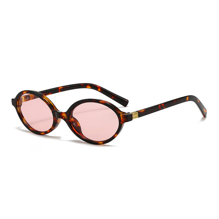 Women's fashionable oval glasses with golden accents Kalsten