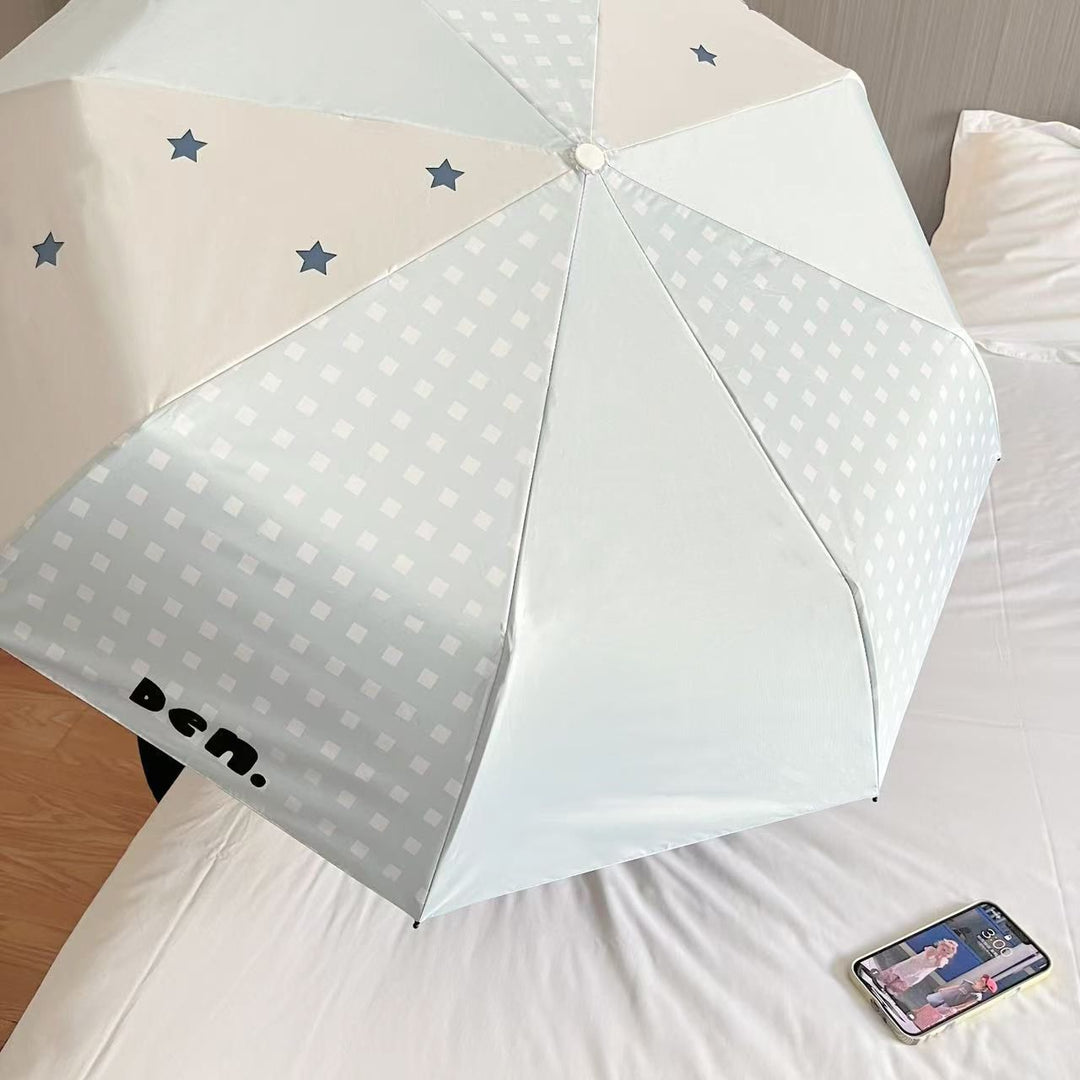 Women's folding umbrella with unique star pattern and practical carrying bag Kalsten