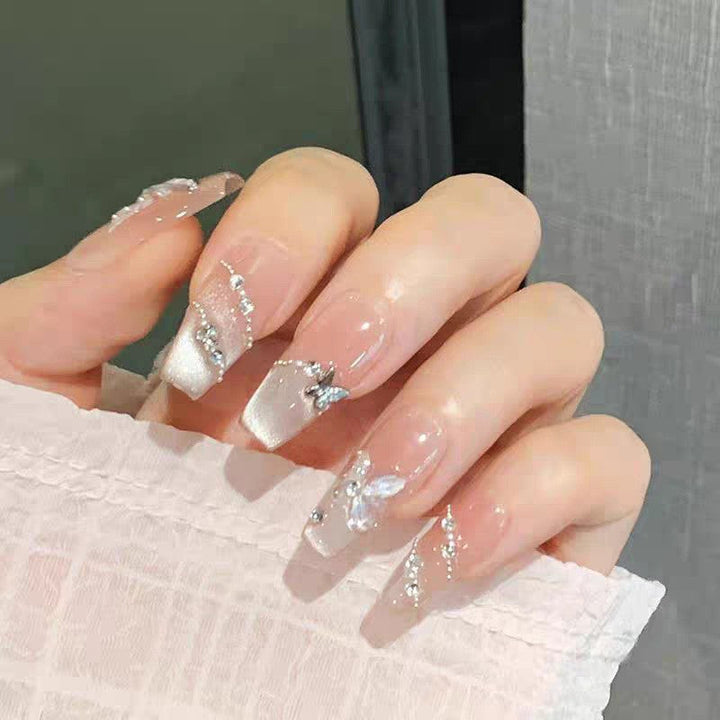 Artificial nails with glamorous decorations and shine Kalsten